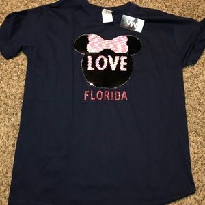 Glitter changing minnie mouse shirt.